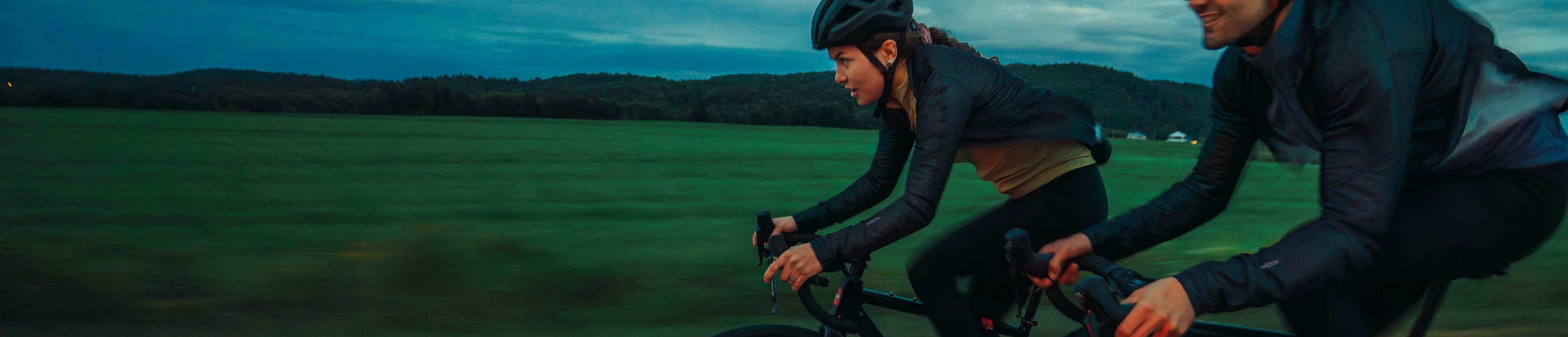 Woman and man riding on bikes